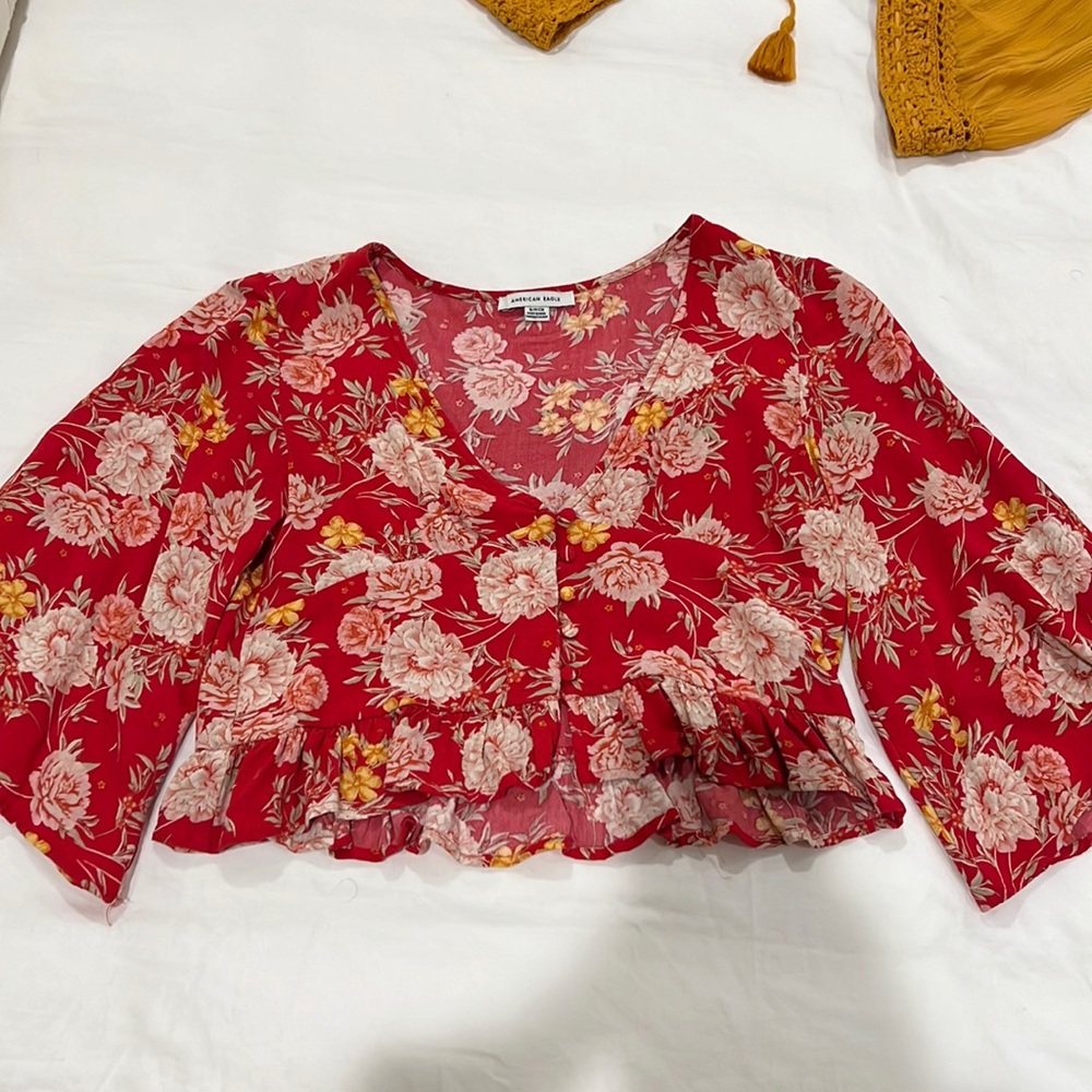 Red floral blouse